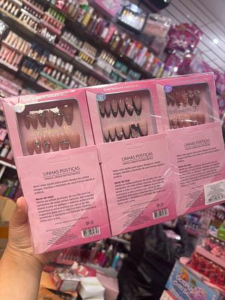 UNHAS POSTICA SABRINA SATO